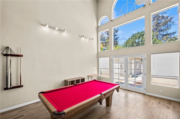 Expansive windows fill the home with natural light.