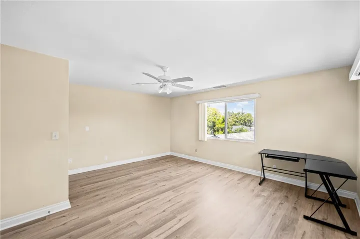 Bedroom #5 – Oversized private suite with room for a dedicated office or study area.
