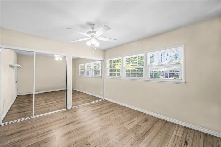 Bedroom #2 – Bright bedroom with room for a desk, study area, and full bedroom furnishings.