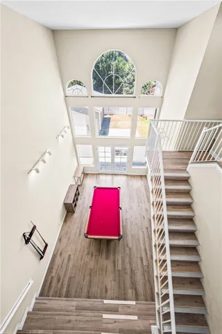 Bright two-story entry welcomes you home.