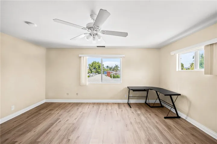 Bedroom #5 – Bedroom easily accommodates a study desk and seating area.