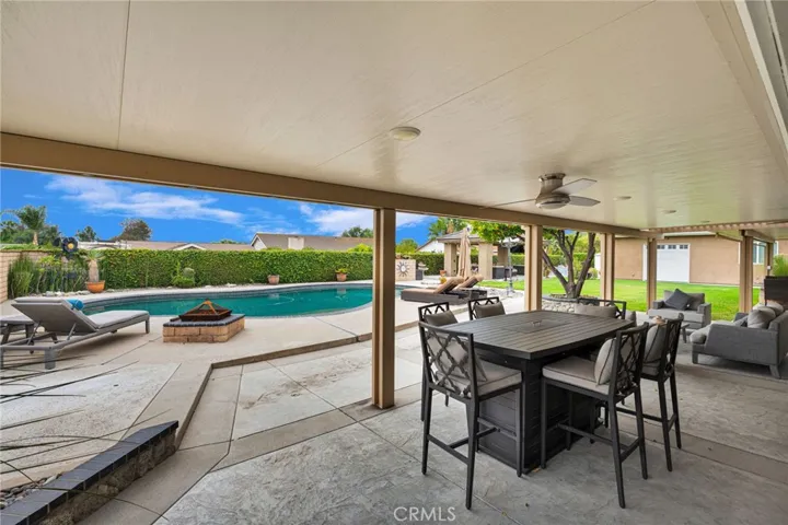 Covered patio overlooking the pool.