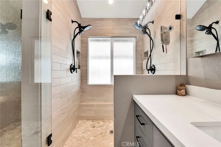 Walk-in shower in primary bathroom.