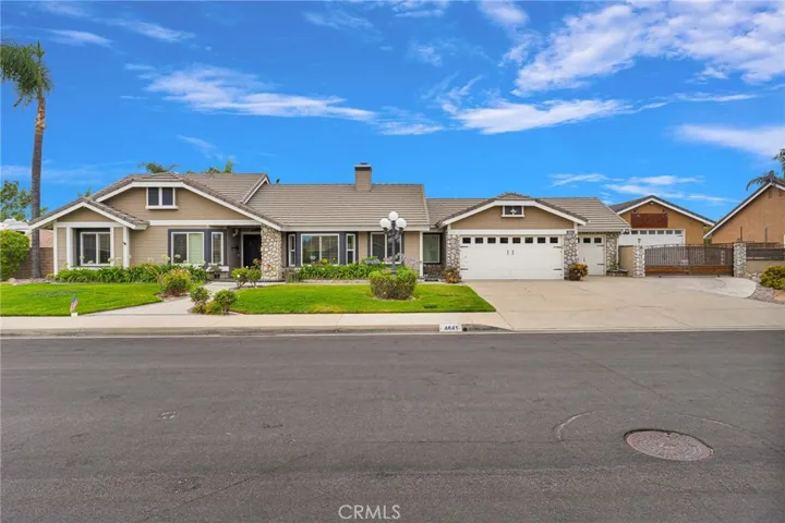 Front of the house on daytime.