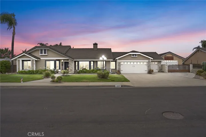 Front of the house with virtual twilight.