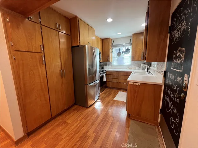 Kitchen panry on left and front door on right