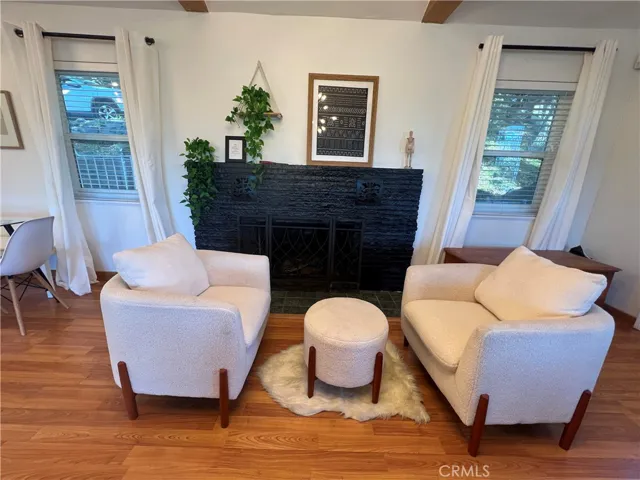 Cozy sitting area in front of fireplace