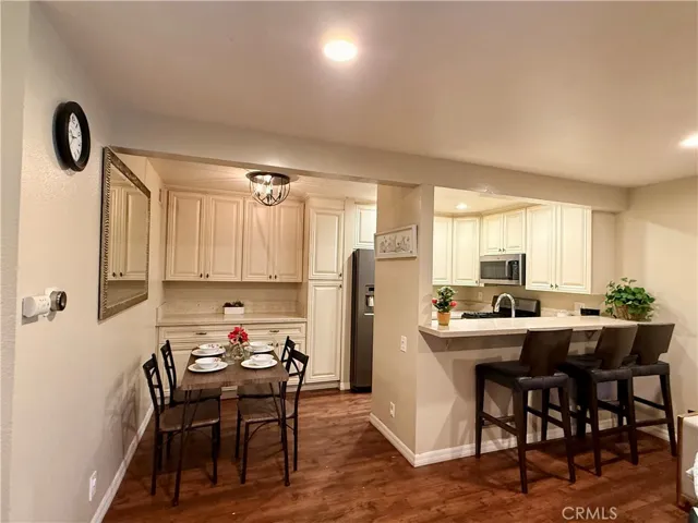 Dining area and kitchen with quartz counter top