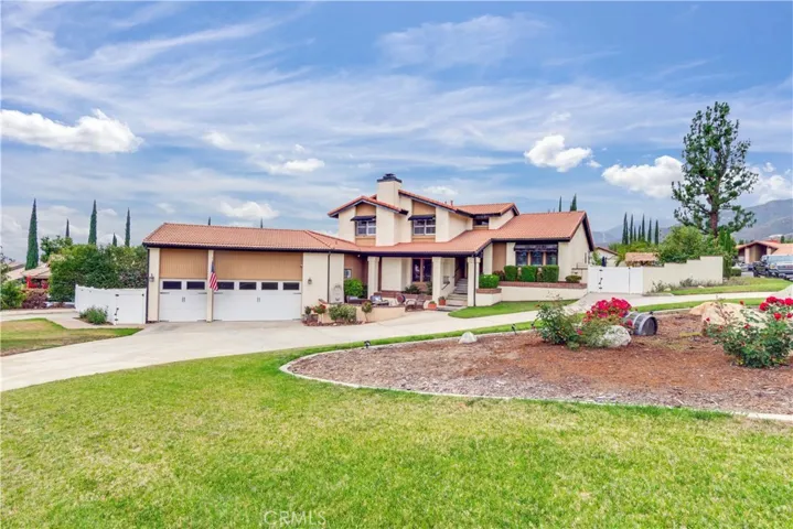 Set back and spacious with a large circle driveway and RV Parking to the left
