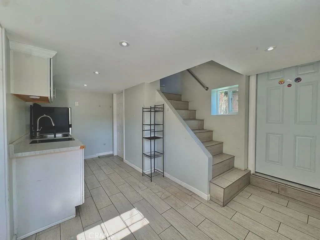DETACHED CONVERTED GARAGE LIVING AREA/KITCHEN