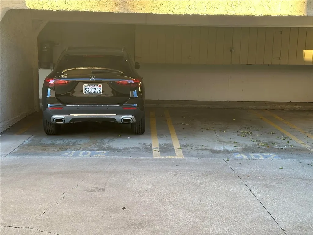 2 Dedicated covered spots under unit