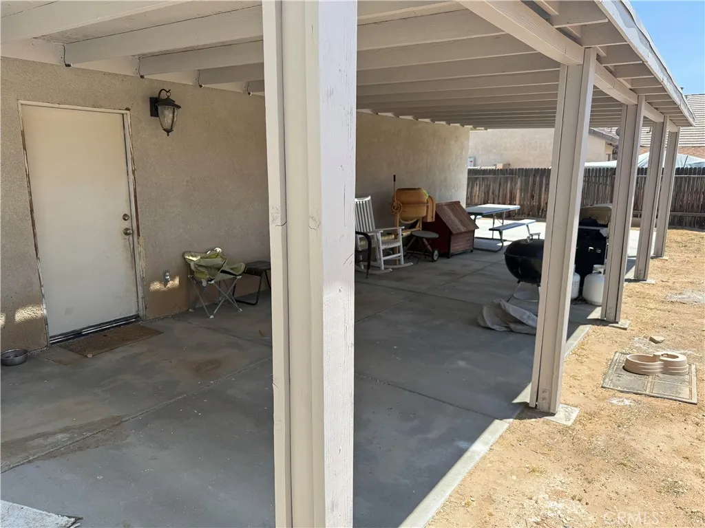 Second patio area behind the garage.