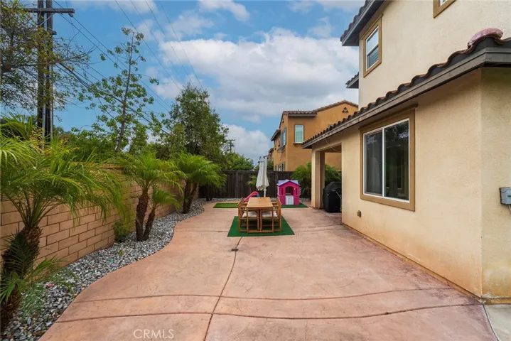 Spacious hardscape for dining and play.