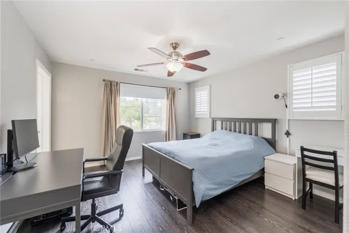 Spacious primary bedroom on second floor with en suite bathroom.