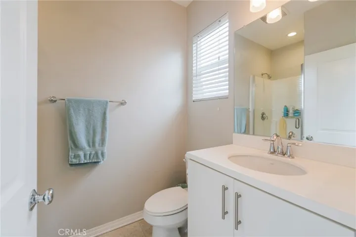 En suite full size bathroom in main level bedroom.