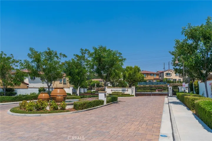 Front entry to the community with secured, gated entry.