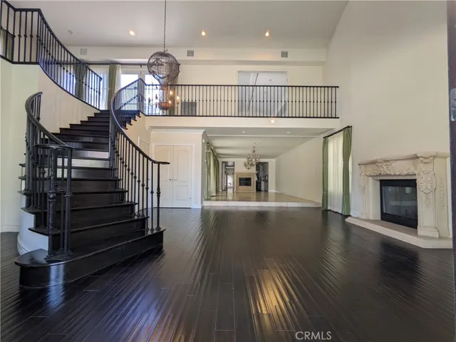Grand spiral staircase greets you!