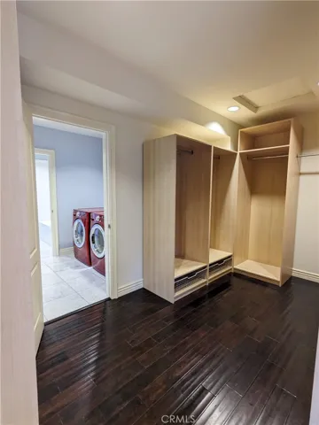 Laundry room through closet