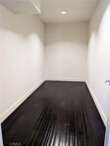 Storage room between great room and primary bedroom