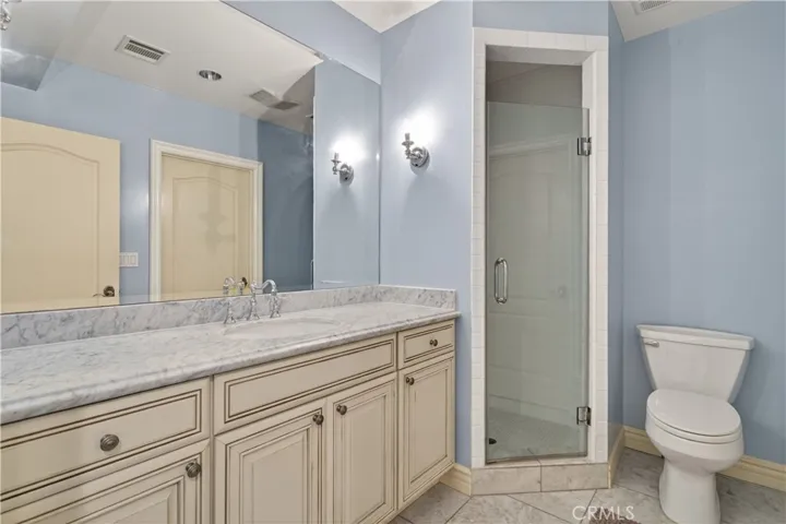 Ensuite bathroom accessible from family room and downstairs bedroom