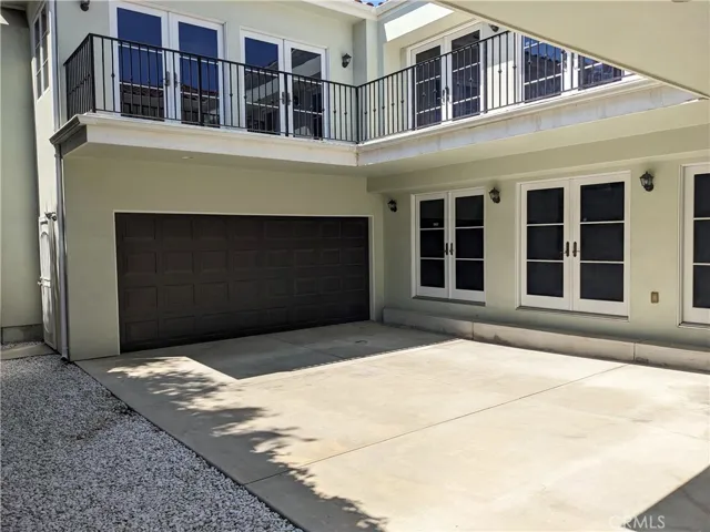 Two car garage and courtyard