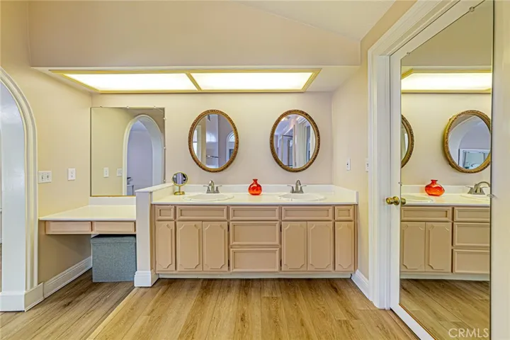 Dual sinks and a dedicated makeup vanity area