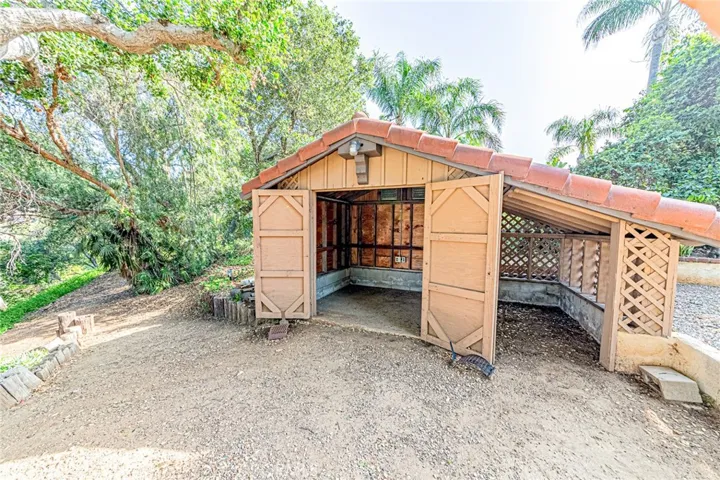 Large custom shed provides abundant storage and versatile space for a workshop, studio, or a variety of other uses