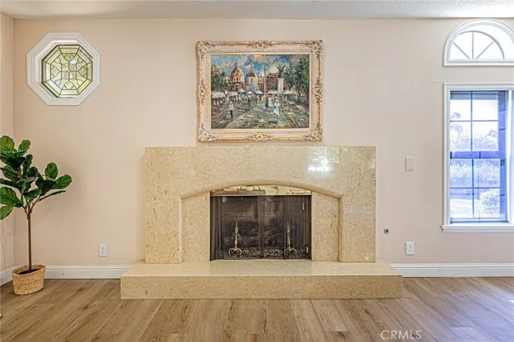Warm and inviting living room featuring a statement fireplace