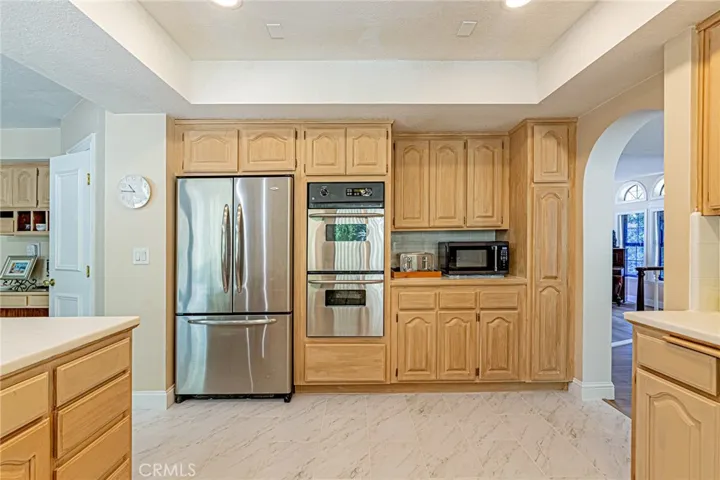 Kitchen featuring abundant cabinetry and storage space