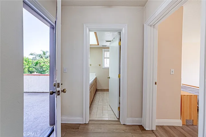 Upstairs bathroom conveniently located by the balcony area