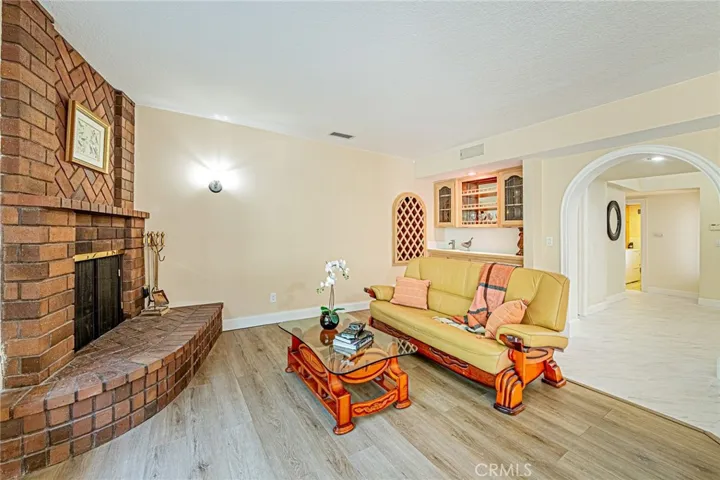 Family room featuring a cozy fireplace