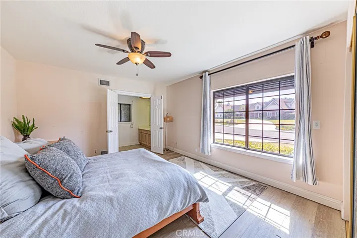 Private downstairs suite featuring serene front yard views