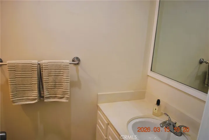 Powder room in the hallway entry