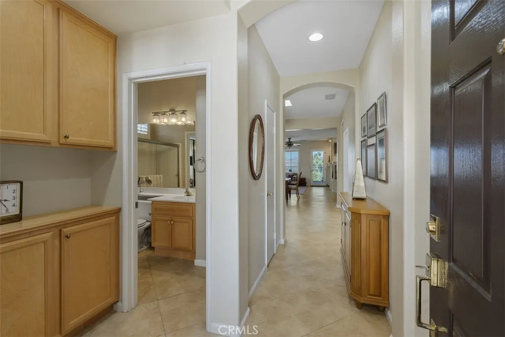 Entry featuring built in storage and a custom built in entry table