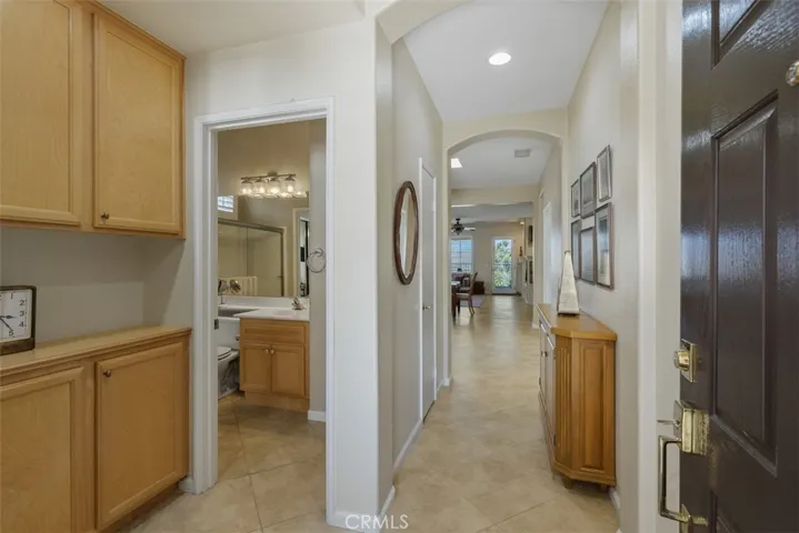 Entry featuring built in storage and a custom built in entry table