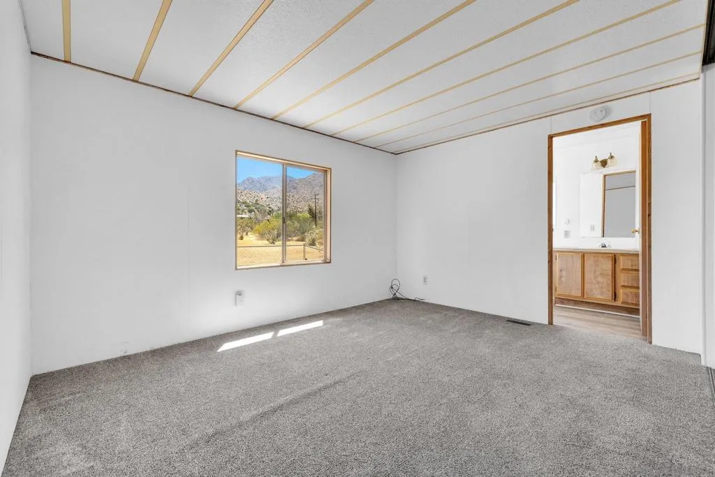 Primary bedroom with ensuite bathroom