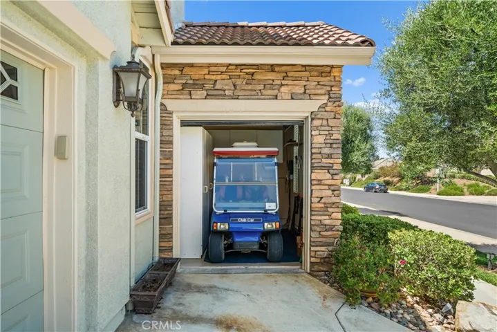 Golf cart garage with storage