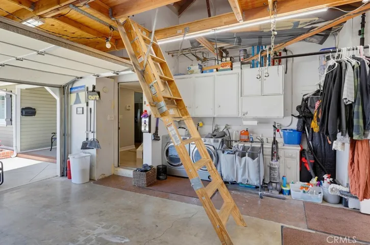 Pull down ladder for  attic storage in garage