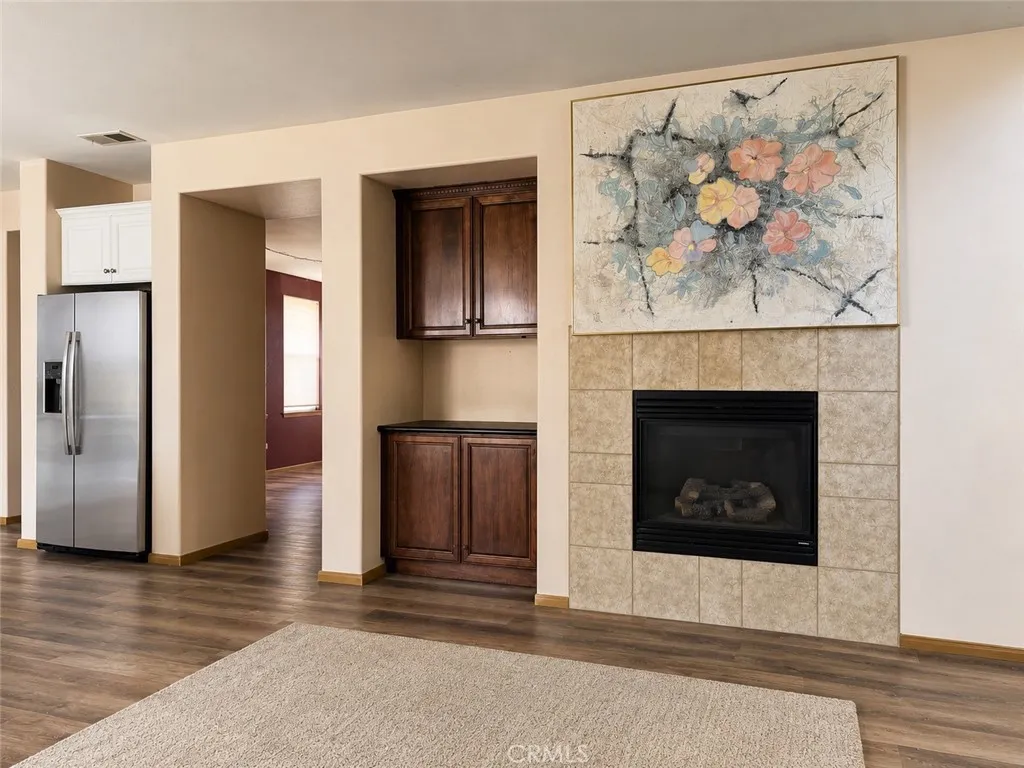 Family Room/Installed Fireplace (Picture is AI Enhanced)