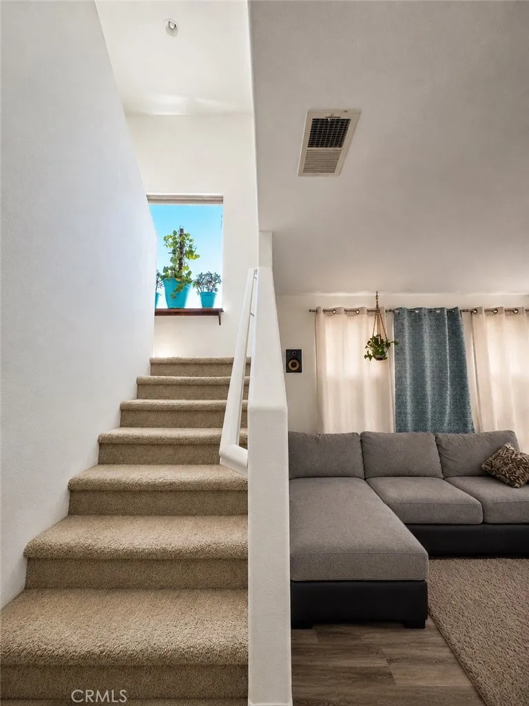 Staircase/Family Room (Picture is AI Enhanced)