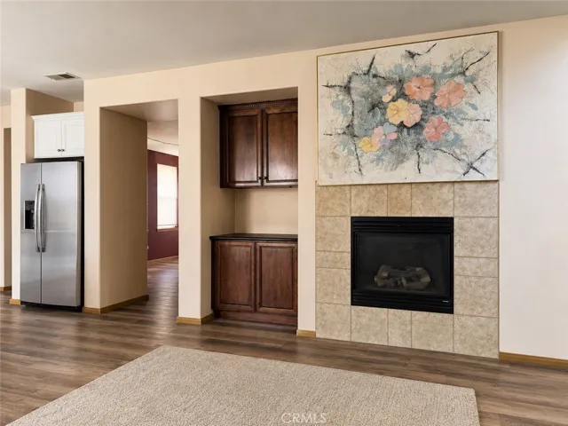 Family Room/Installed Fireplace (Picture is AI Enhanced)