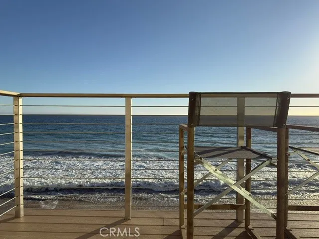Pre-Fire  Ocean View: Former balcony sunset view showcasing sweeping Pacific Ocean exposure from the La Costa Beach parcel.