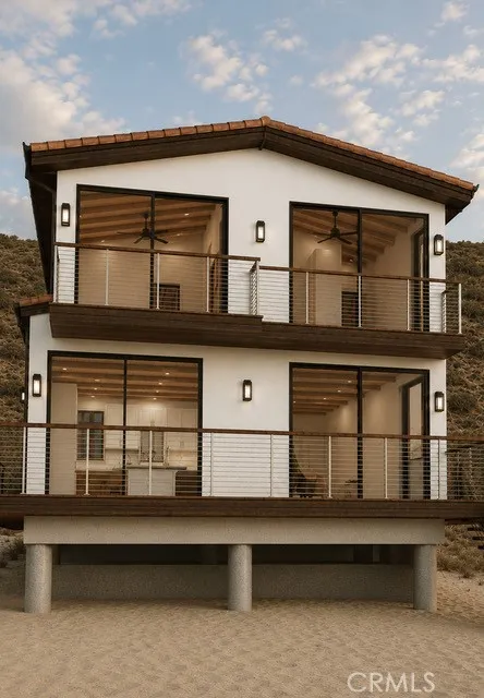 Architectural Rendering: Beach-facing elevation designed by Clear Architecture, featuring expansive glass openings, direct ocean orientation, and modern Mediterranean architectural details.