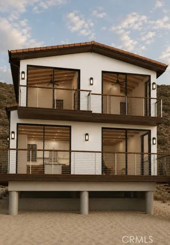 Architectural Rendering: Beach-facing elevation designed by Clear Architecture, featuring expansive glass openings, direct ocean orientation, and modern Mediterranean architectural details.