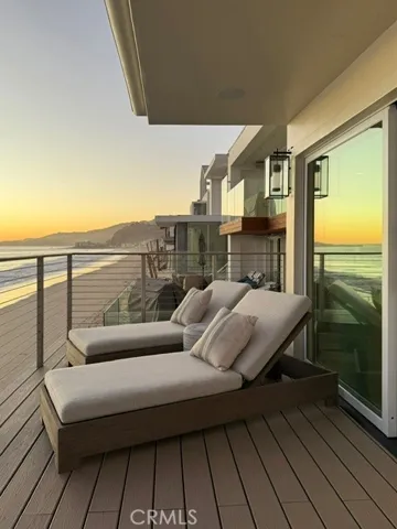 Pre-Fire Ocean View: Sunset from the former balcony, showcasing the extraordinary Pacific Ocean exposure and golden-hour views enjoyed from this La Costa Beach oceanfront parcel.