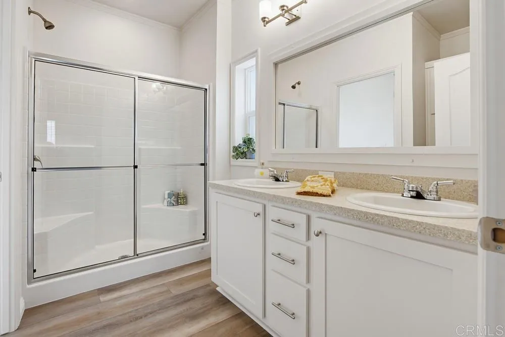 Large Primary Bathroom ensuite with Walk-In Shower, Storage Cabinets