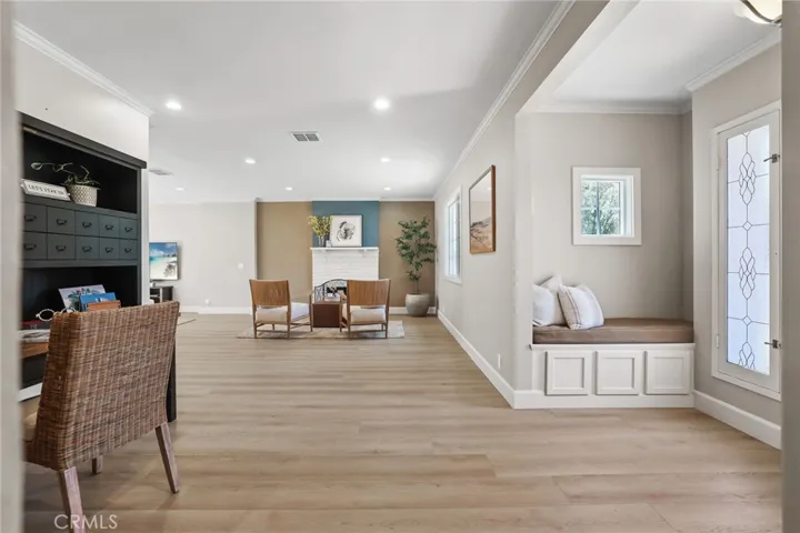 Open concept family/living room area blends seemlessly from the entry.