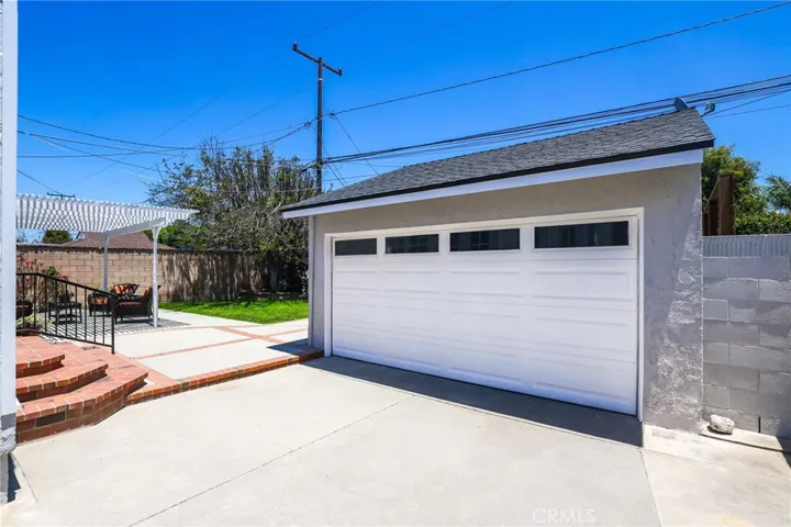 2-car detached garage has great access from the front and side doors.