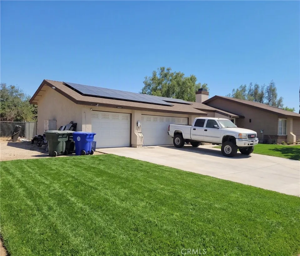 Photo is Virtually Staged with Grass