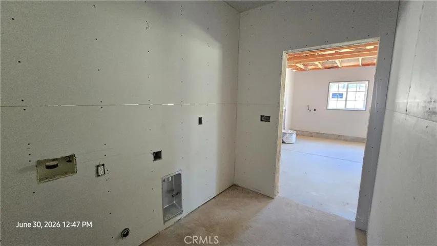 Laundry Area & Door to Garage